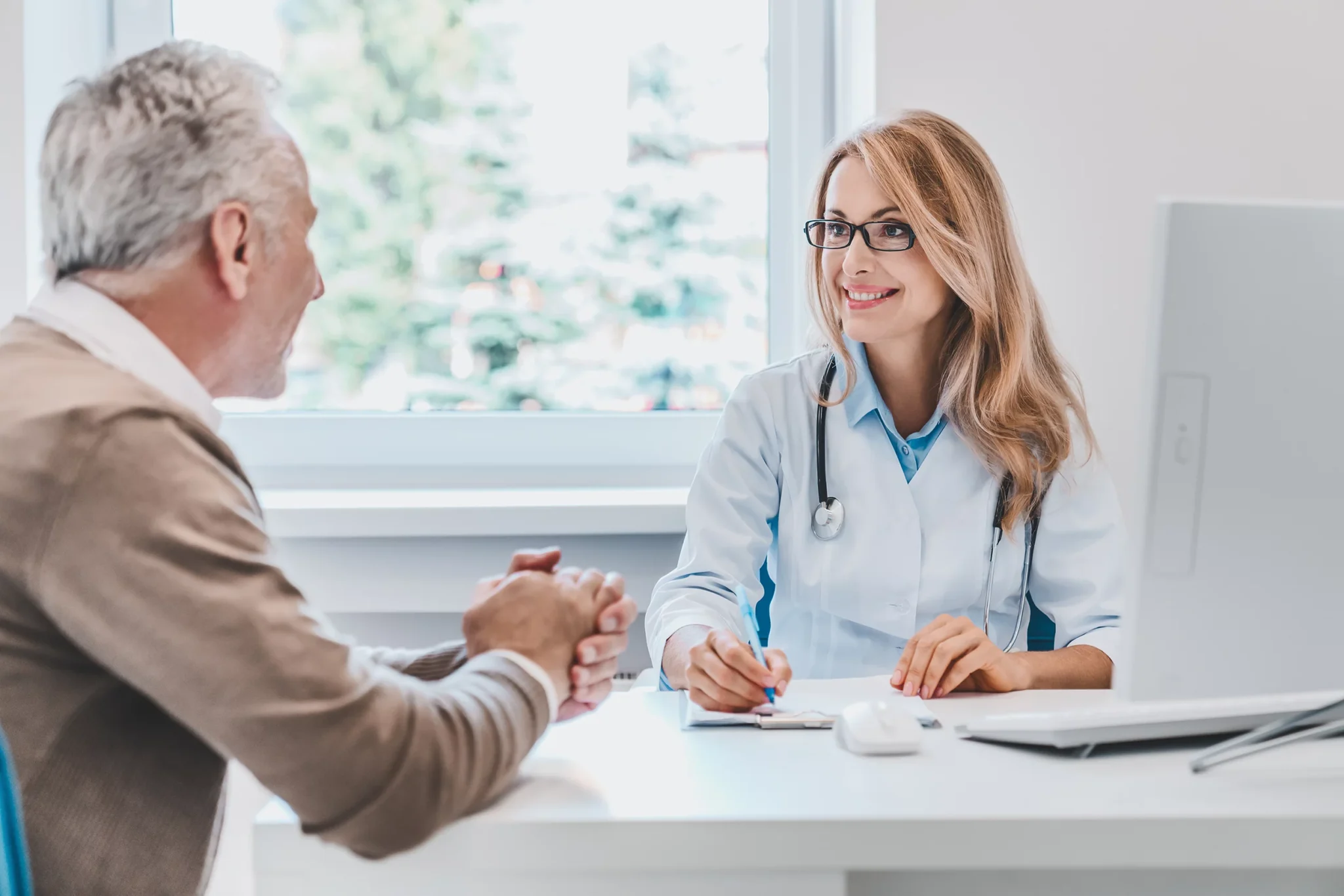 doctor-with-patient-in-medical-office-hospital-2023-11-27-05-02-50-utc